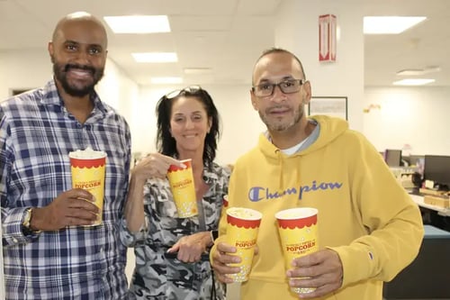 NetTEL USA workers taking a snack break in Melville, NY.